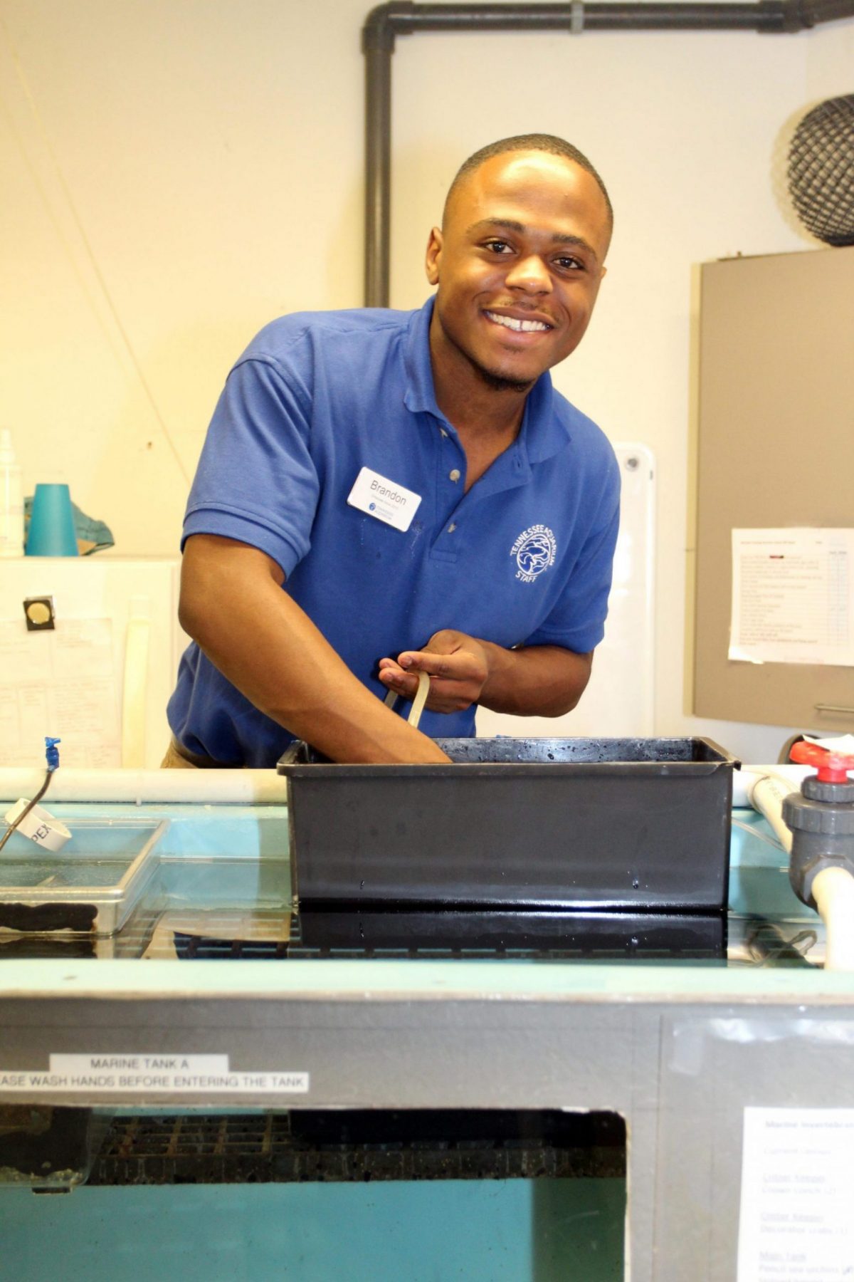 Brandon Robinson behind the scenes at the Aquarium