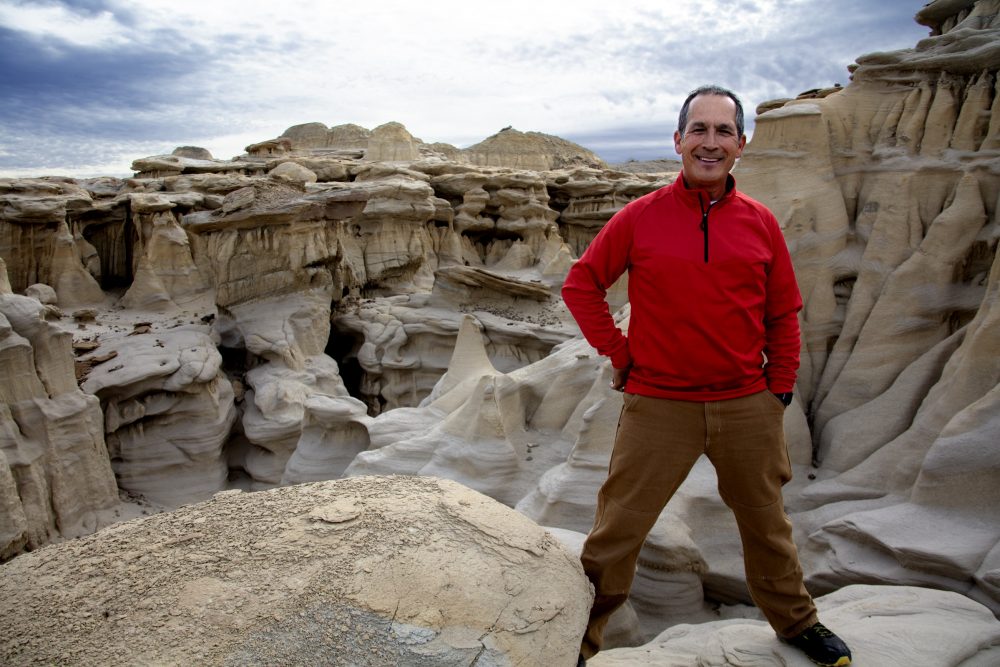 Astronaut John Herrington stands above the other-worldly hoodoo formations in New Mexico’s Ah-Shi-Sle-Pah Wilderness