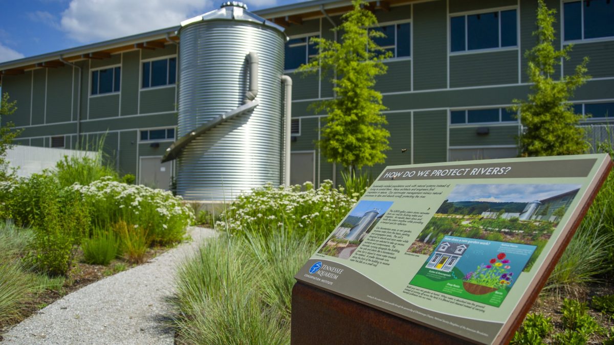 A sign sits near the rain-collecting cistern at the Tennessee Aquarium Conservation Institute.