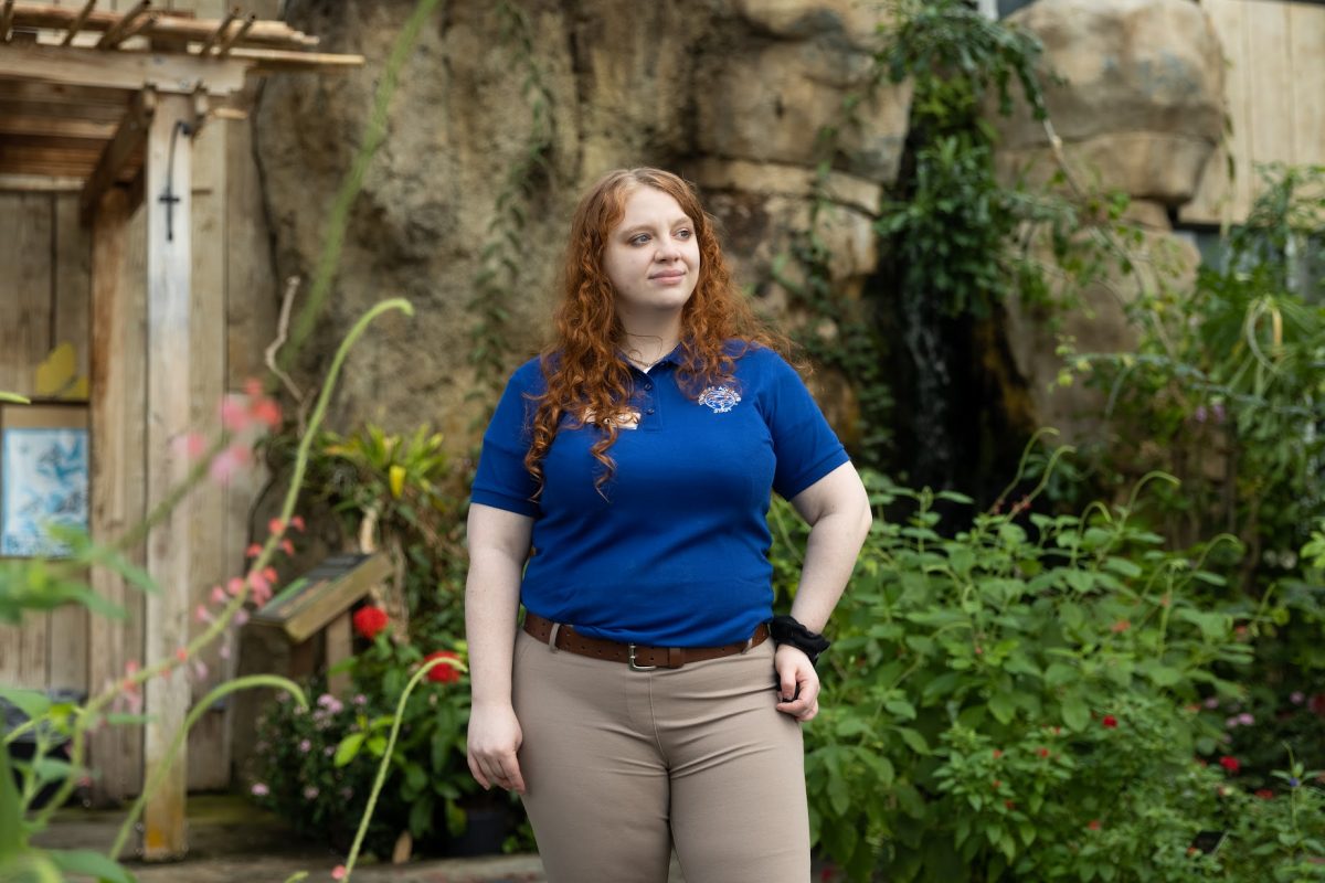 Entomologist Rose Segbers standing in the Tennessee Aquarium's butterfly garden