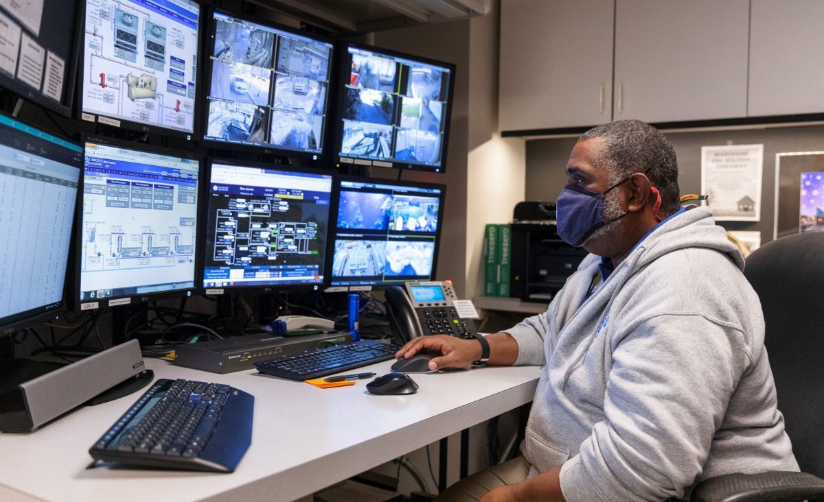 Senior Life Support Systems Operator Sean Hill at control desk