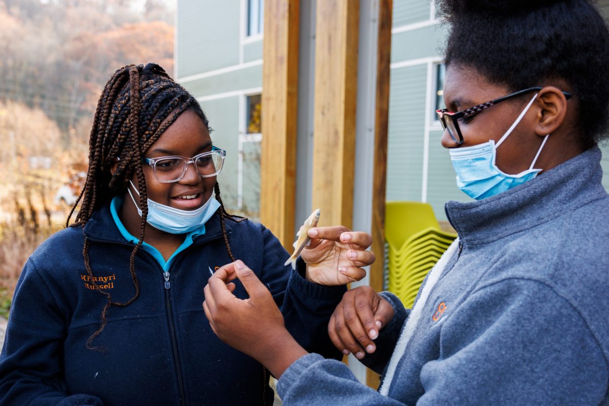 Students from Chattanooga Girls Leadership Academy go hands-on with preserved museum specimens at the Tennessee Aquarium Conservation Institute