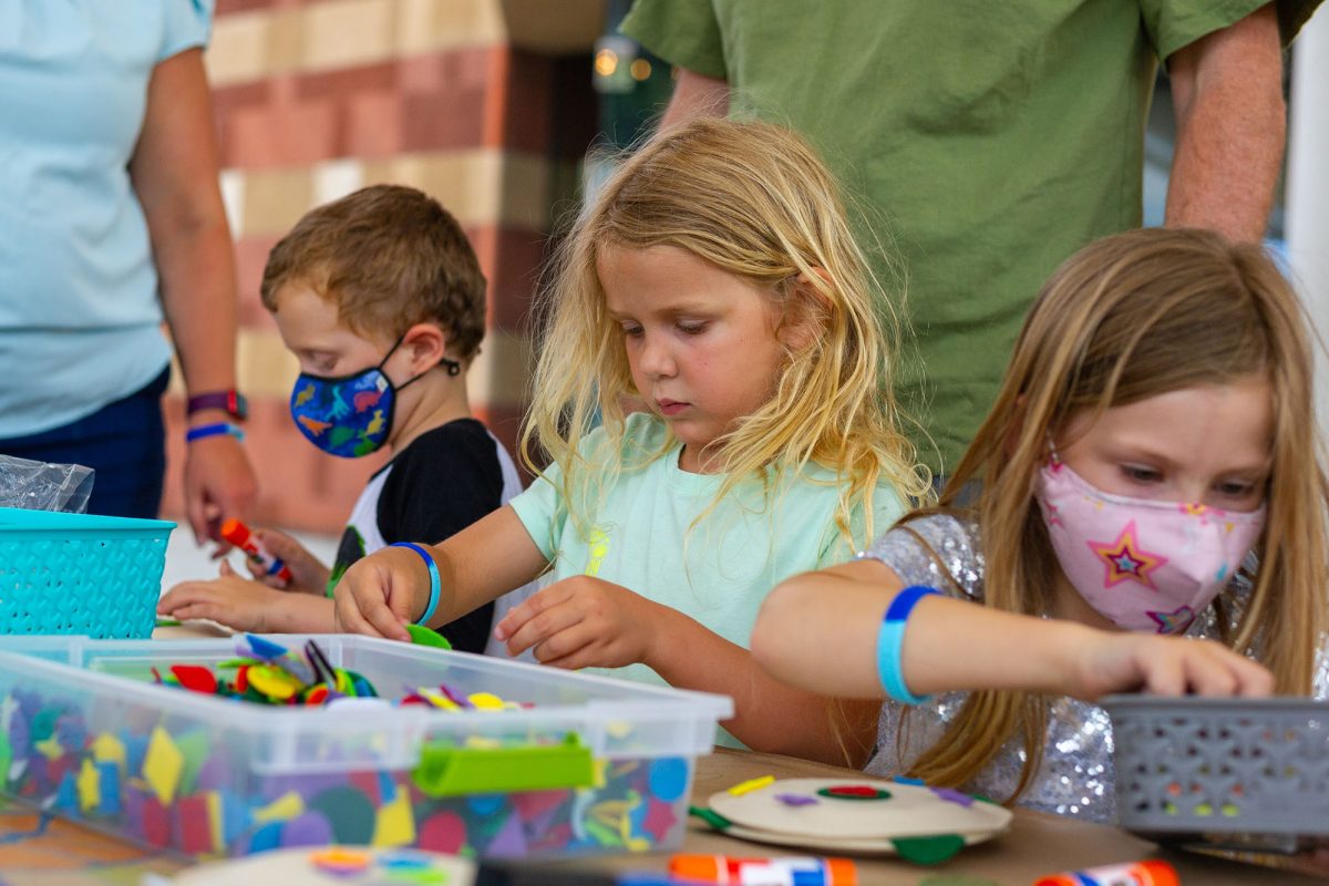 Children make ocean themed crafts