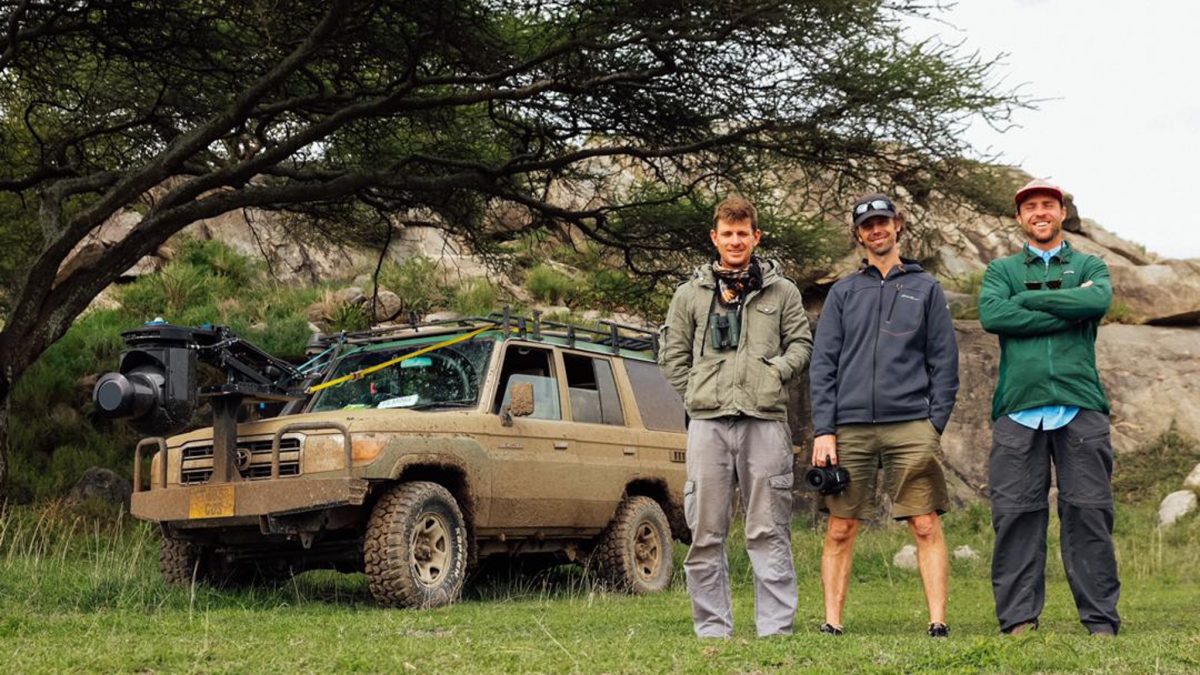 Serengeti 3D filmmakers in front of jeep with camera
