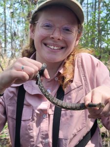 Jocelyn Stalker holding snake