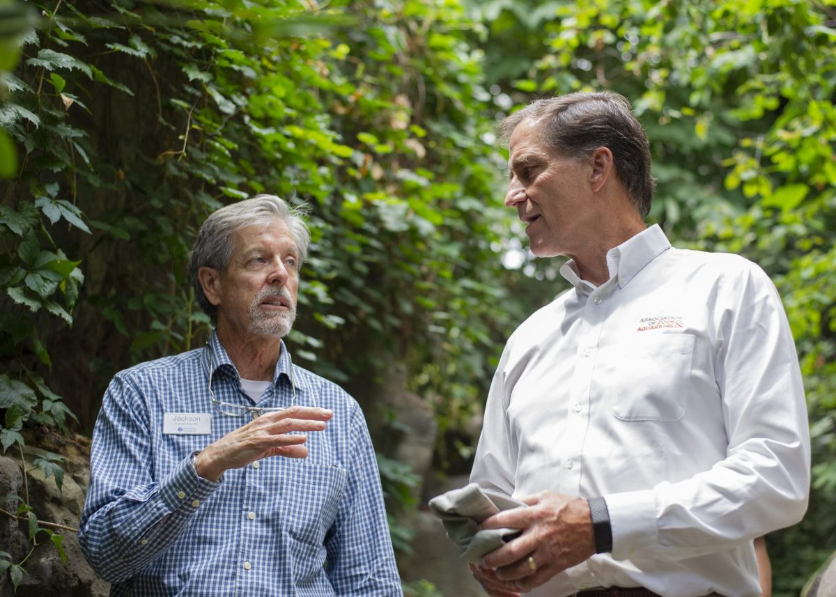 Jackson Andrews speaks with Association of Zoos and Aquariums President Dan Ashe during a 2019 visit