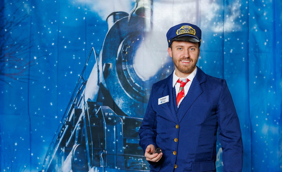 Brandon McIntosh is dressed as the conductor from Polar Express 3D.