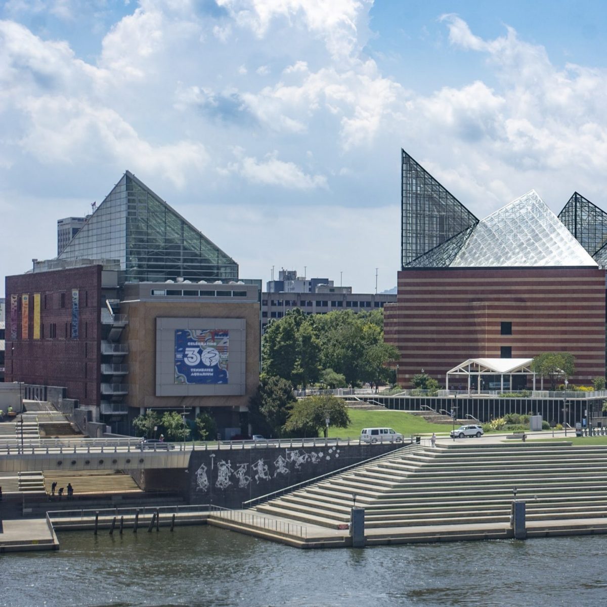 A picture from the perspective of the Market Street Bridge in Chattanooga looking south at the rear of the Tennessee Aquarium