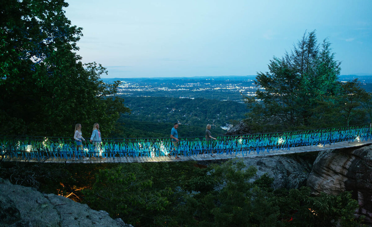 Adventurers cross the Swing-A-Long Bridge at Rock City. (Credit: Rock City)