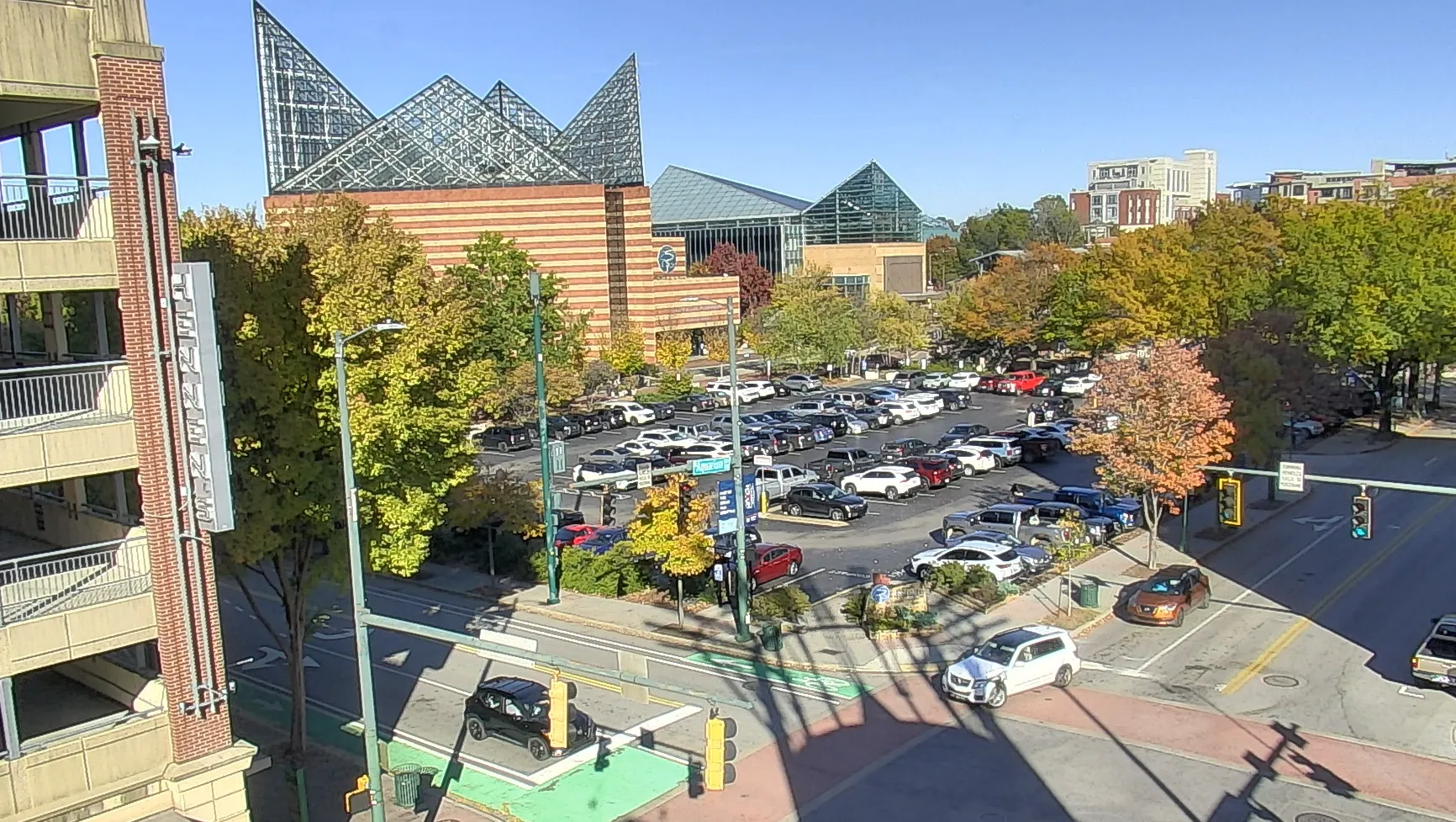 sunny day view of the two Tennessee Aquarium buildings from the IMAX theater building