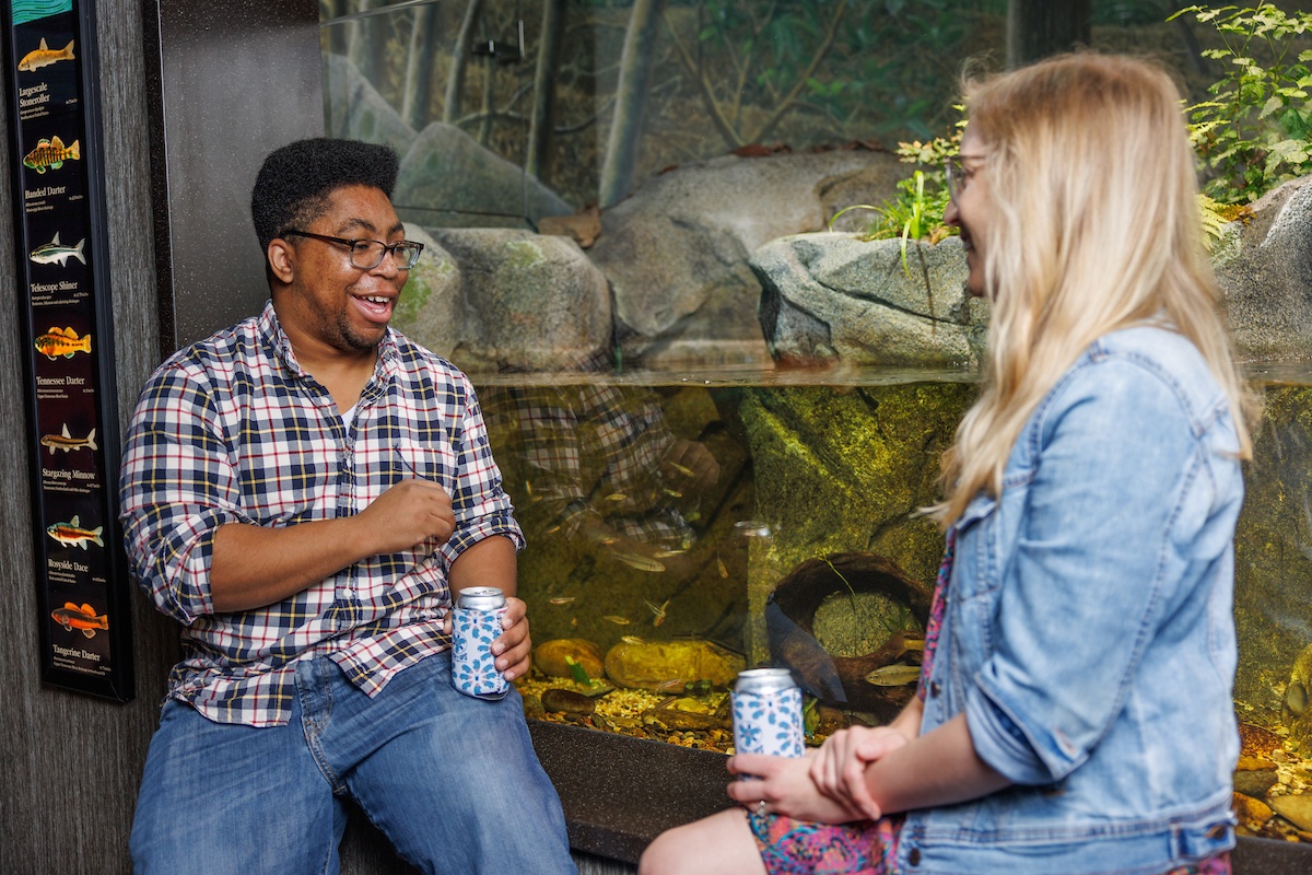 Two guests enjoying the annual Fish & Sips event at the Tennessee Aquarium