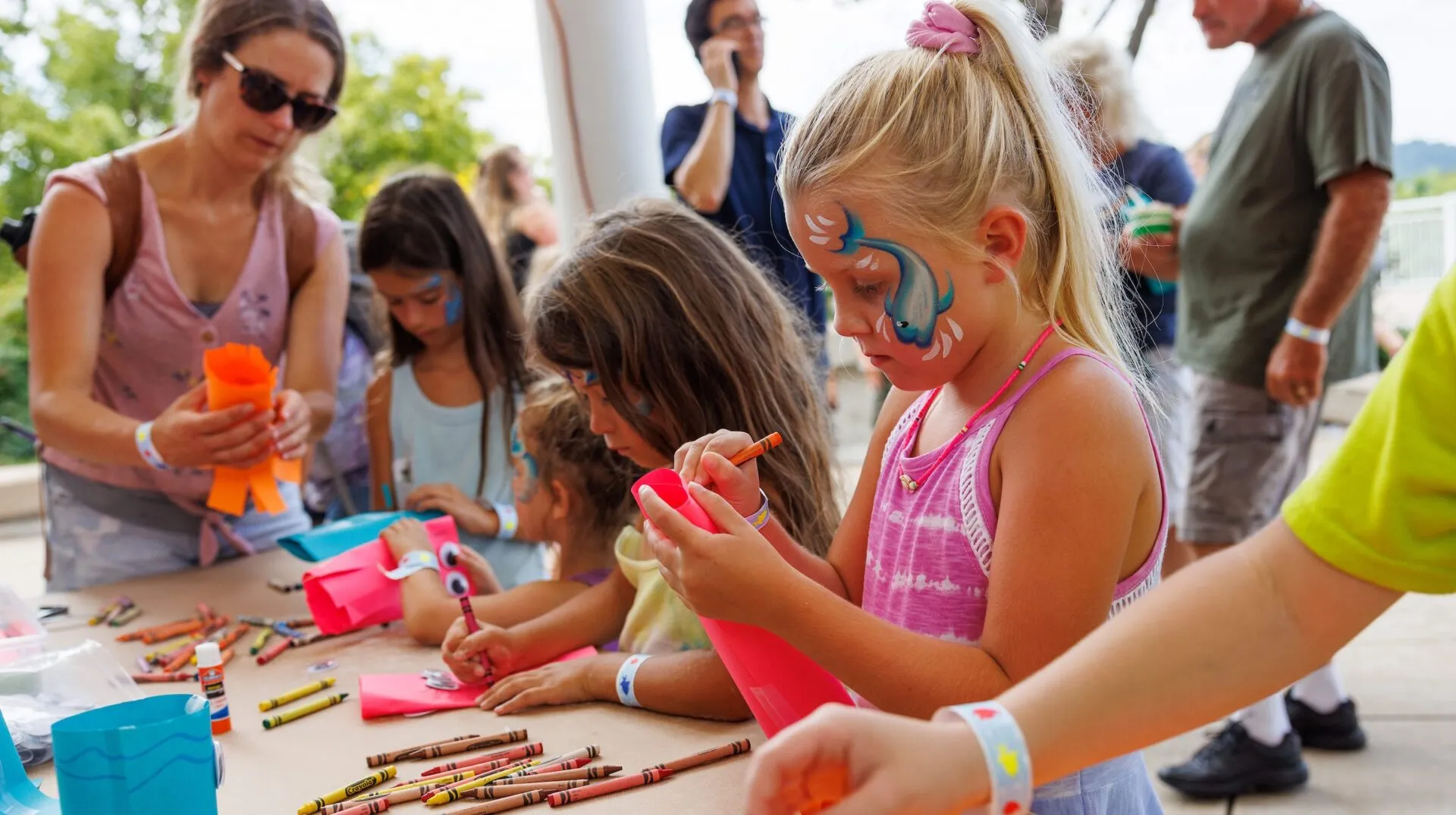 Kids painting a craft