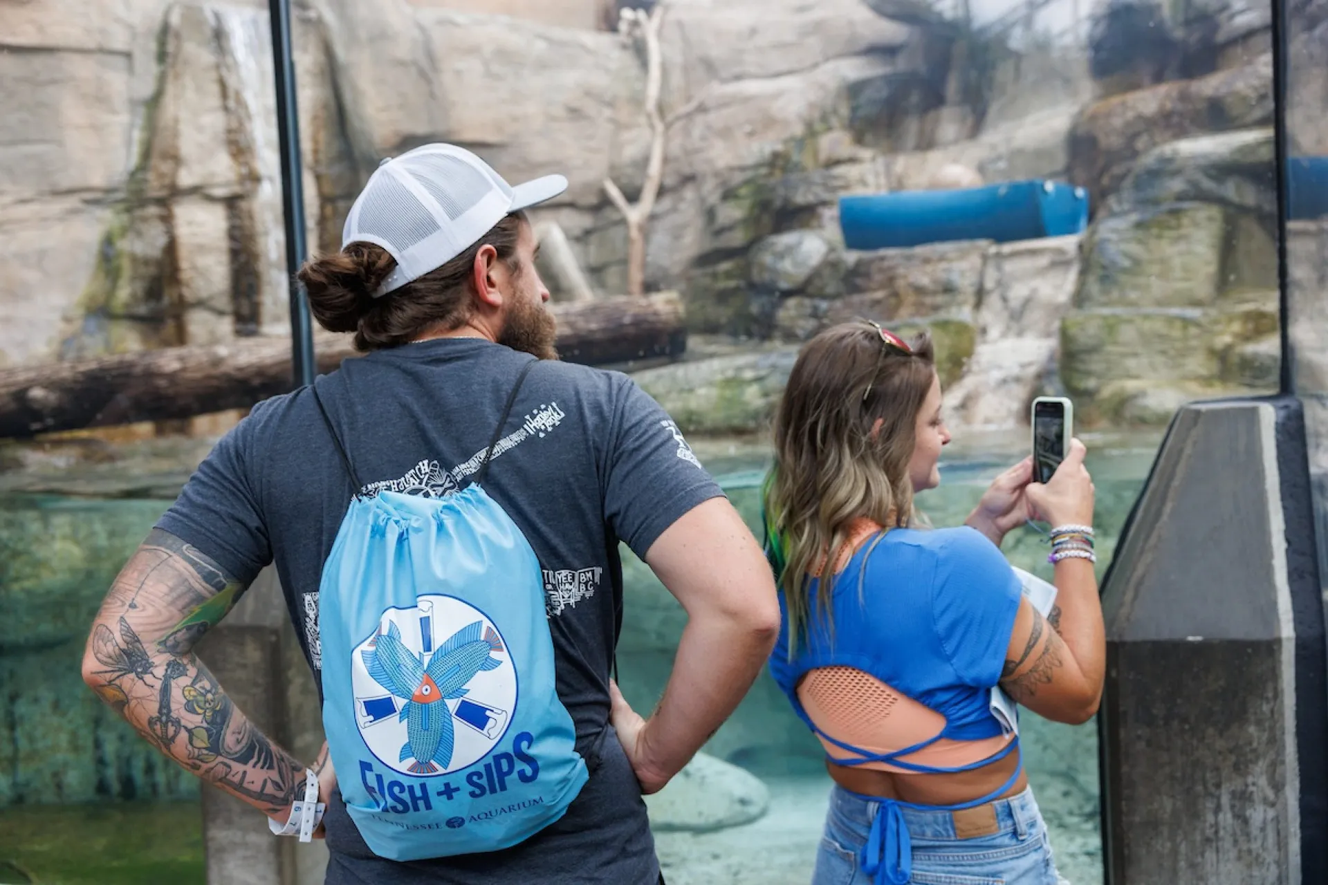branded fish and sips backpack