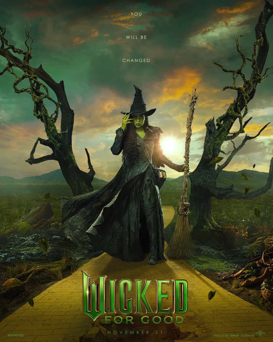 Character Elphaba from Wicked with a dramatic sunset mountain scene in the background