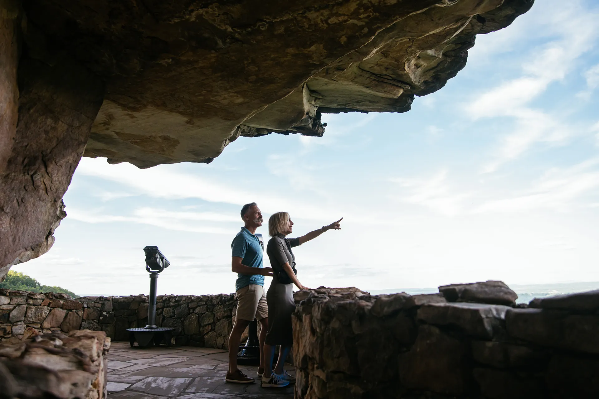 Visitors enjoying the views from an overlook at Rock City on Lookout Mountain