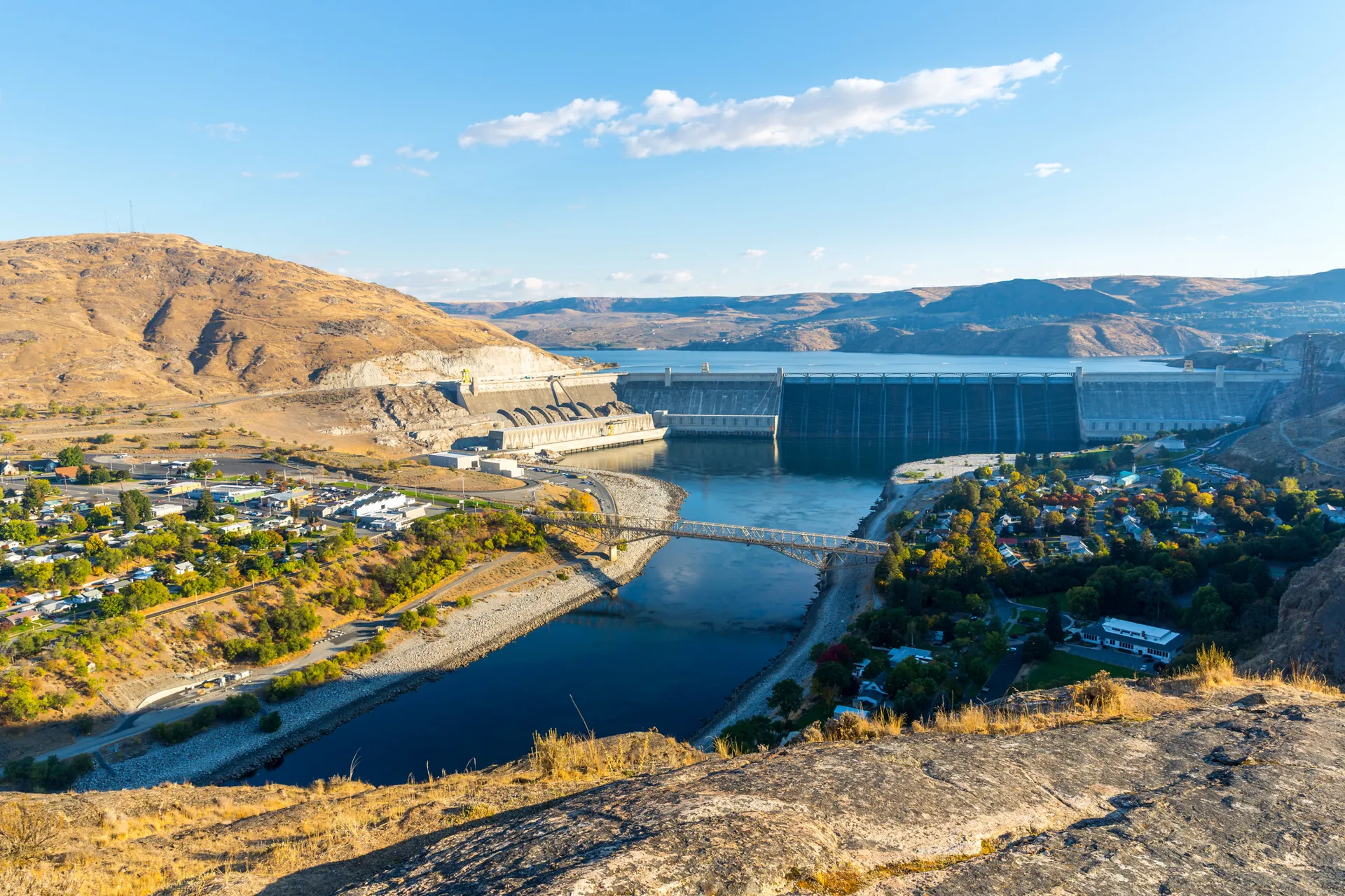 Washington State's Grand Coulee Dam stretches across the Columbia River with Franklin D. Roosevelt Lake in the background.