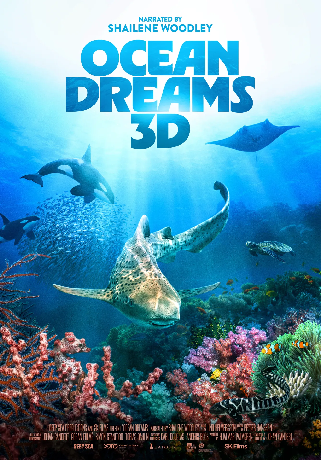 Ocean Dreams 3d documentary poster with a coral reef in the foreground and a shark, orca whale, and manta ray