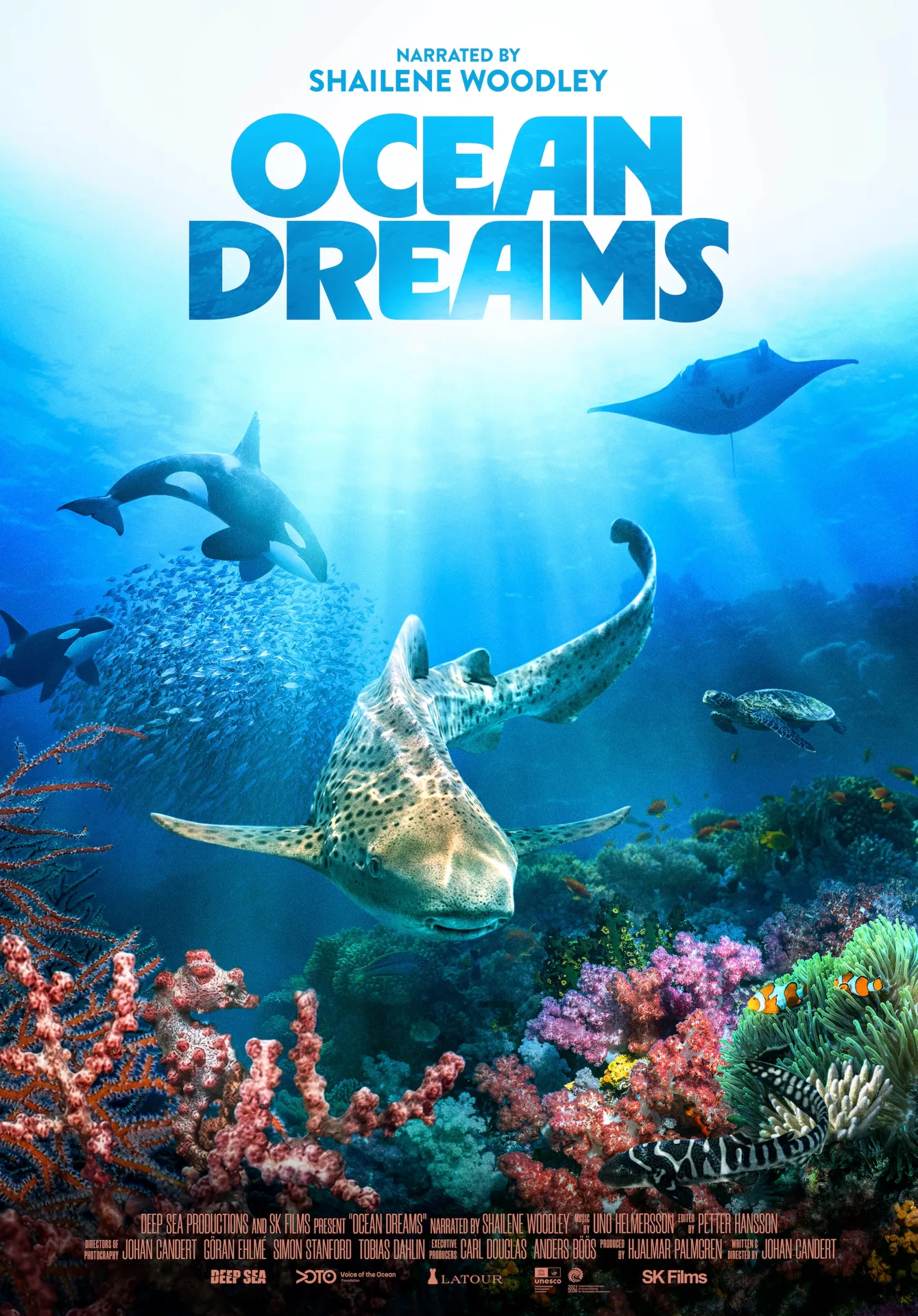 Ocean Dreams 3d documentary poster with a coral reef in the foreground and a shark, orca whale, and manta ray