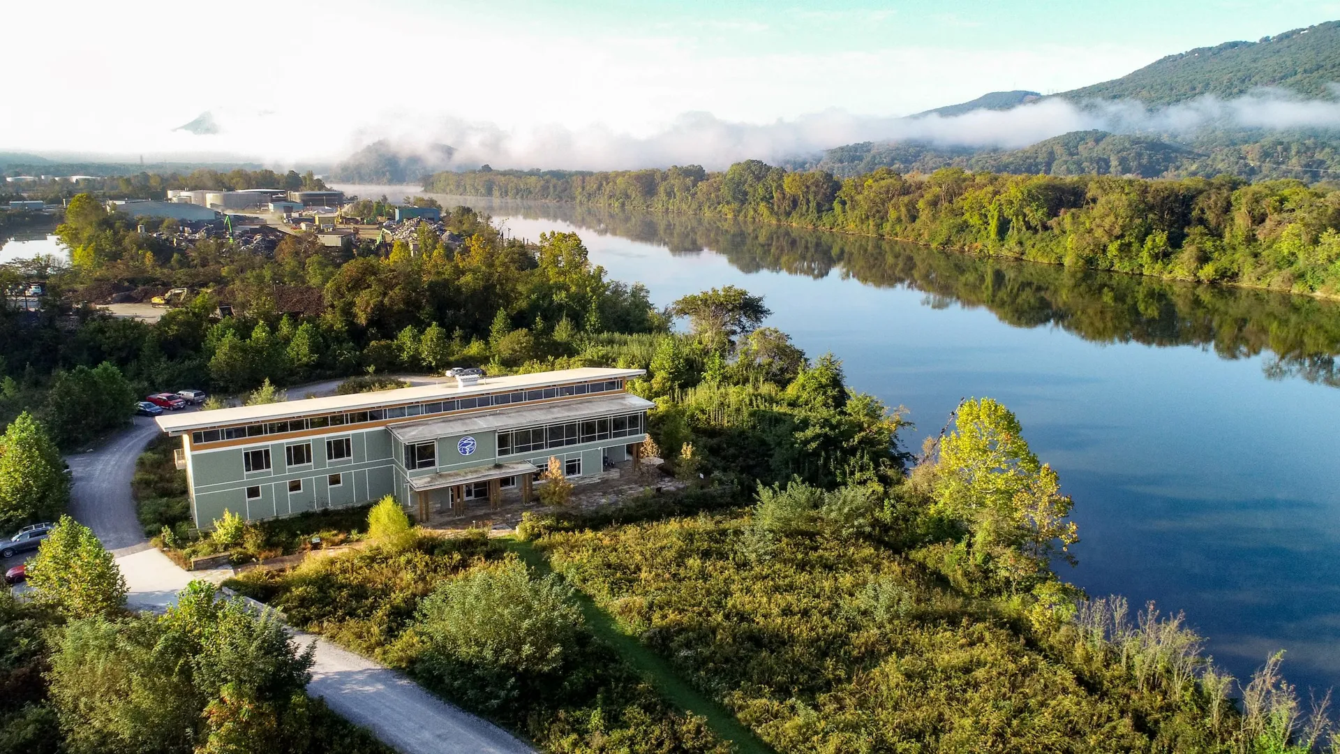 An aerial view of the Tennessee River with the Tennessee Aquarium Conservation Institute visible. The Tennessee River was named one of the top 10 rivers in Tennessee by freshwater scientists at the Tennessee Aquarium. Each of the selected rivers will be highlighted in signs posted on the Aquarium Plaza through the end of July in celebration of America’s 250th anniversary.