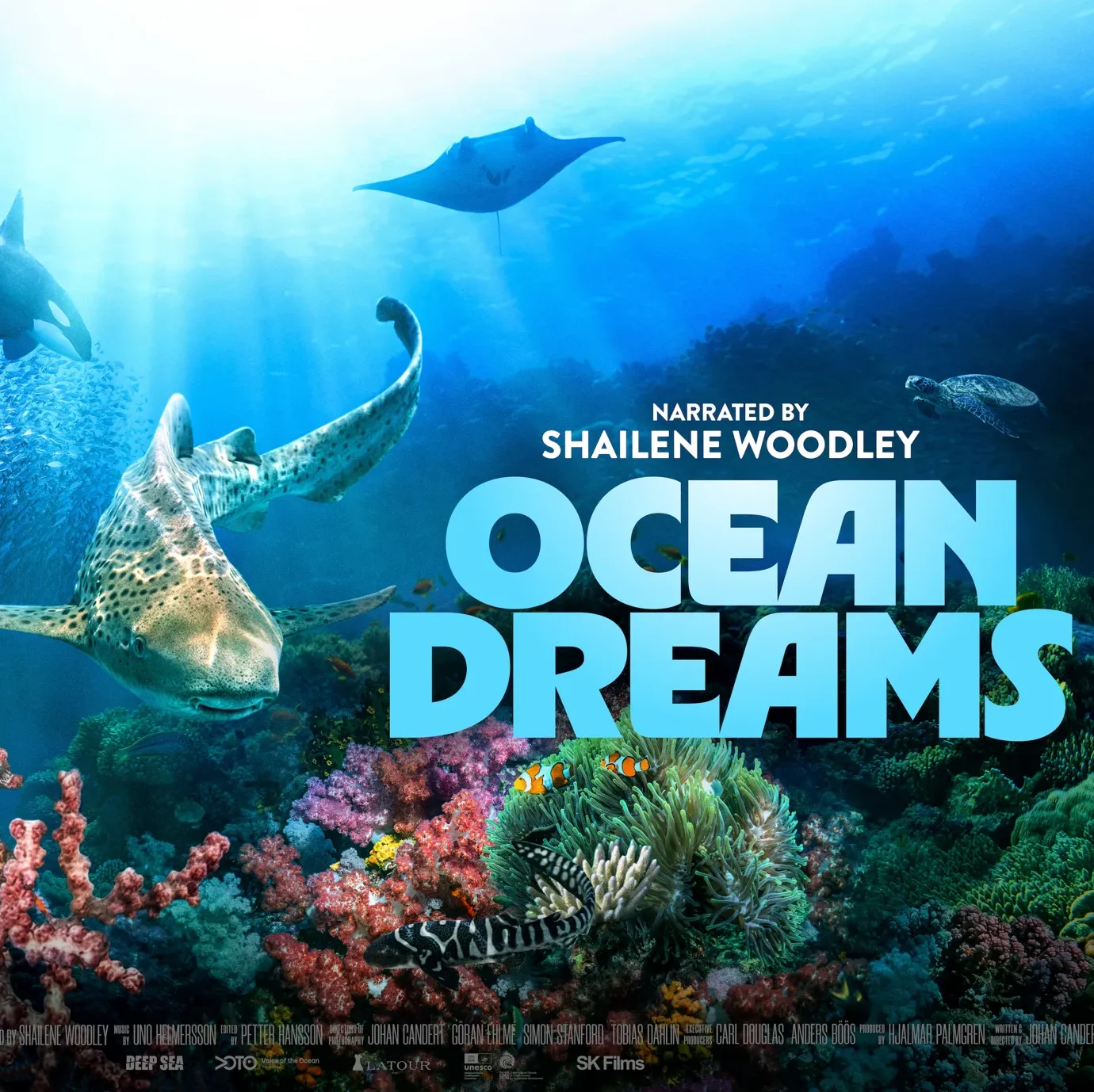 Ocean Dreams 3d documentary poster with a coral reef in the foreground and a shark, orca whale, and manta ray