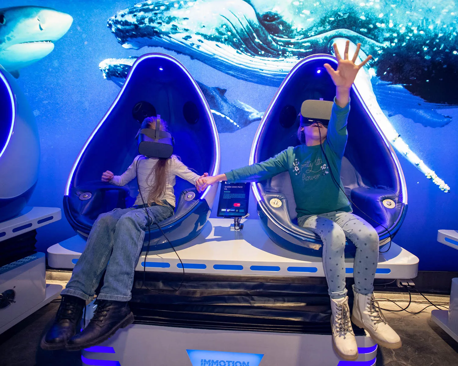 Guests enjoy an Undersea Explorer virtual reality experience. (Credit: IMMOTION Entertainment)